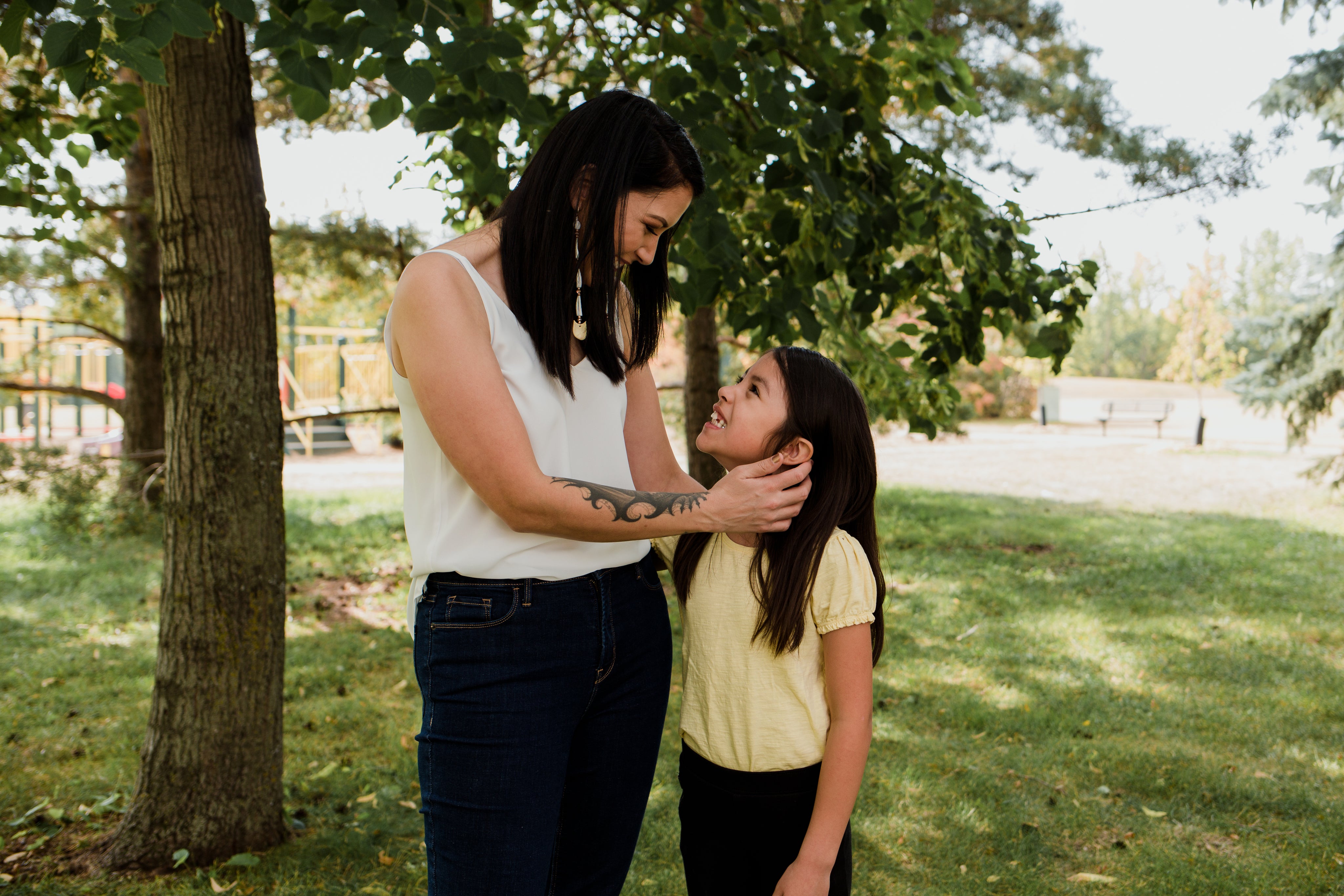 files/woman-and-child-smile-at-each-other-standing-outside.jpg